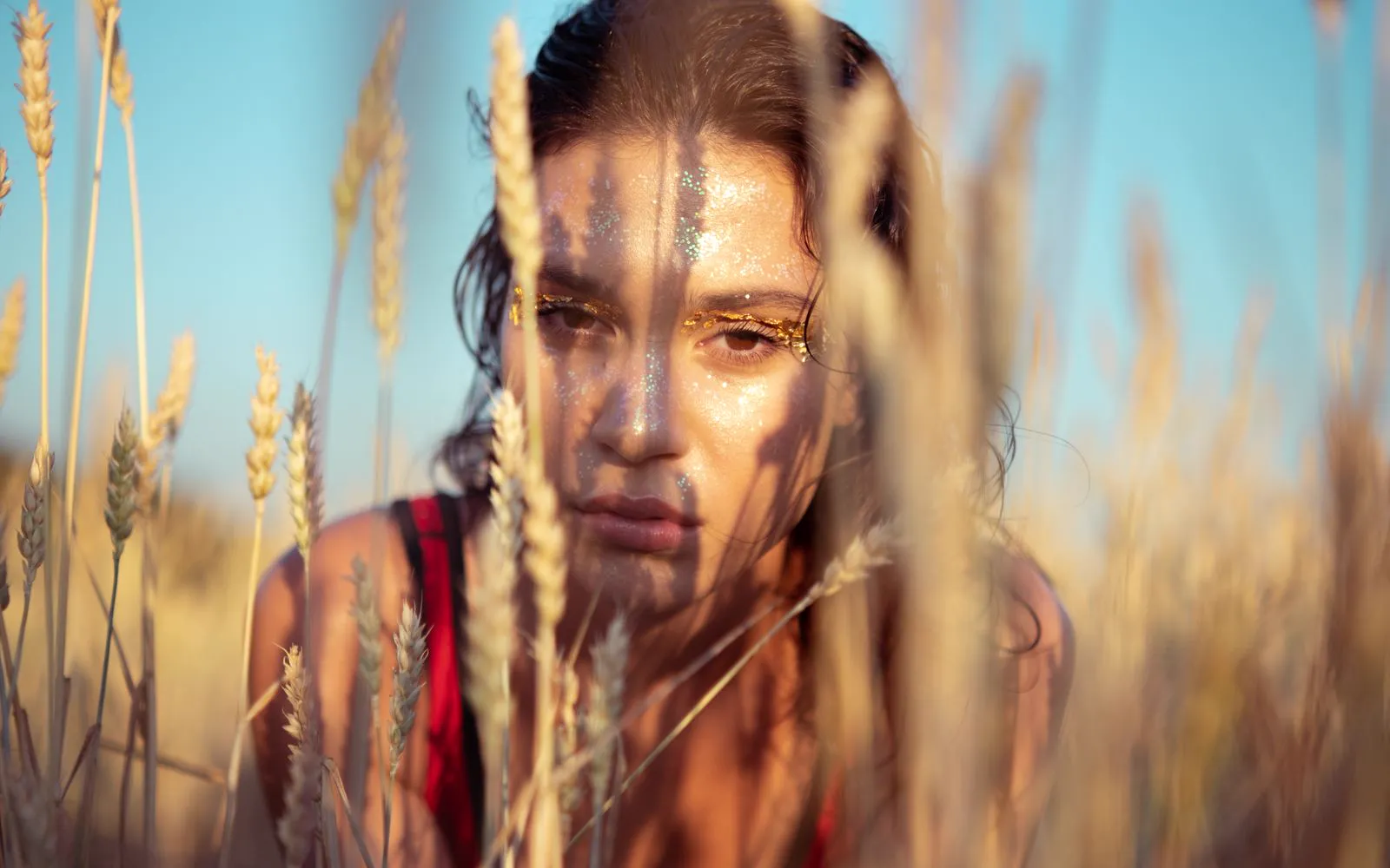 A stock photo of a woman in a wheat field, as shot.